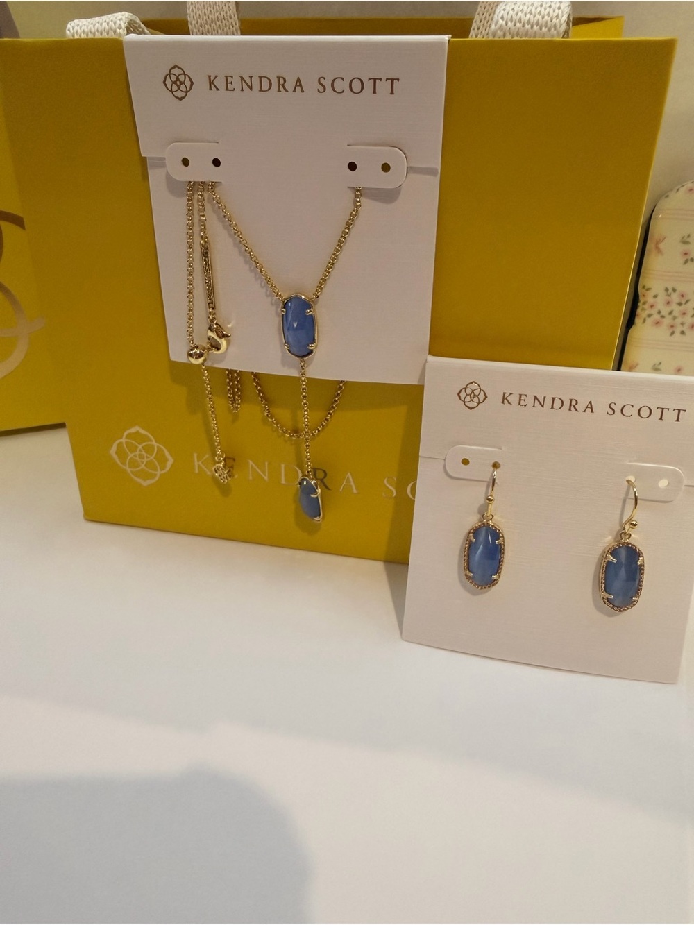 Kendra Scott Goldtone Blue Pendant Necklace and Earrings Set - Picture 3 of 4